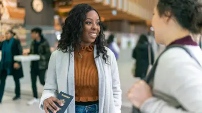 Foto of student wit passport