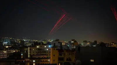 Gunfire is fired into the sky from Beirut's southern suburbs in the early hours of April 17, 2026, as residents celebrate the start of a 10-day ceasefire that took effect at midnight. 