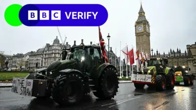 A tractor passes Parliament 