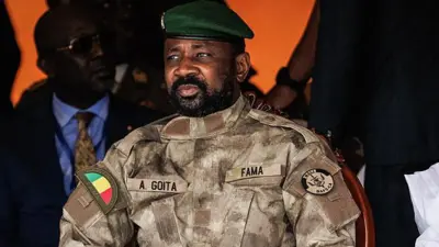 Man on military outfit wit green beret