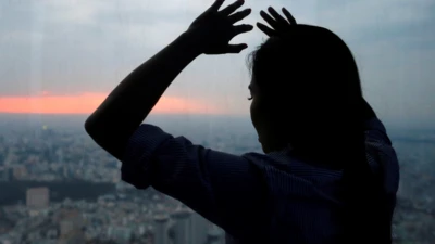 silhouette of a troubled woman 