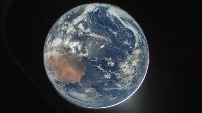 A picture of the Earth from space, which centres the planet against a dark background.