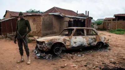Officer stand for front of burnt car
