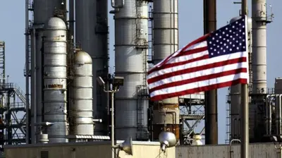 A US flag outside Chevron's oil refinery in Pascagoula, Mississippi