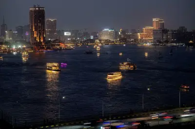 Boats sails along the Nile River in the Egyptian capital Cairo.