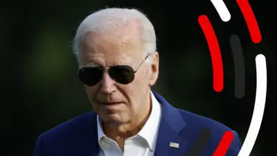 Joe Biden in black sunglasses