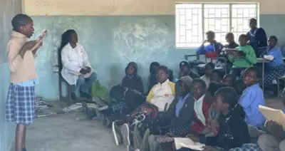 School children inside classroom 