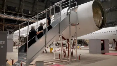 Immigration enforcement staff board training plane