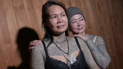 शरीरभरि ट्याटू बनाएका थाई महिला 