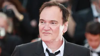 Quentin Tarantino in a suit at the Cannes film festival in 2023