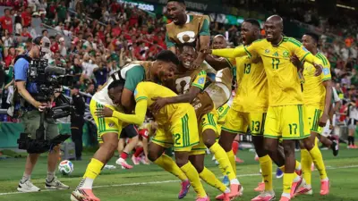 Thapelo Maseko of South Africa celebrate wit teammates afta e score di team first goal during di FIFA World Cup 2026 Group A match between South Africa and Korea Republic for Monterrey Stadium on June 24, 2026 in Guadalupe, Mexico. 