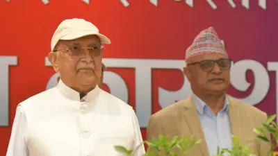 नेकपा एमालेका अध्यक्ष केपी ओली र हिक्मत कार्की