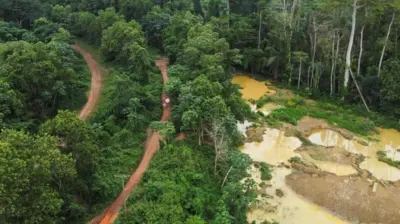 A drone view shows the excavated pits for illegal mining at the Prestea-Huni Valley Municipal District in the Western Region, Ghana, on 17 August 2024