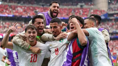 Azzedine Ounahi merayakan gol setelah mencetak gol untuk Maroko melawan Kanada