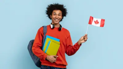 Man dey wave Canadana flag as im carry books