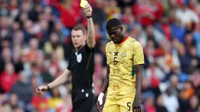 Thomas Partey of Ghana look dejected as chop yellow card from Referee Oscar Johnson during the International Friendly match for 2026