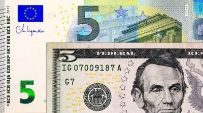 5 євро і 5 доларів