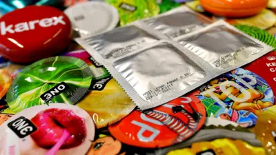 Packs of flavoured condoms are seen at the Malaysian condom-maker Karex Industries headquarters in Port Klang in September 2017.