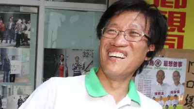 區錦新在澳門街頭為立法會選舉宣傳拉票（2013）