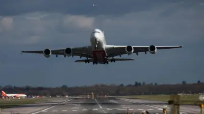 A plane taking off from Gatwick's runway in 2025