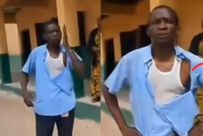 Ọgbẹni Ismail Abdulahi to wọ aṣọ olomi aro, ti aṣọ naa ti ya niwaju