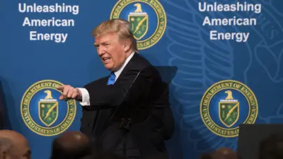 US President Donald Trump points after speaking during the Unleashing American Energy event at the Department of Energy in Washington DC, US