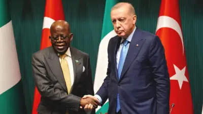 Bola Tinubu shaking Recep Tayyip Erdoğan 