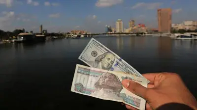 صورة تعبيرية لعملات نقدية