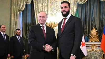 Putin ve Şara el sıkışırken 