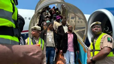 Nigeria nationals wey comot from South Africa land Lagos