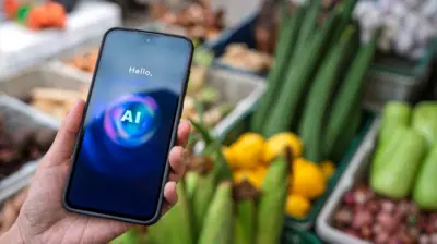 Ekranında "AI" yazan bir telefon tutan bir el ve arka planda sebze meyveler 