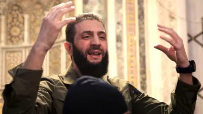 Hayat Tahrir al-Sham (HTS) leader Abu Mohammed al-Jawlani speaks to a crowd at the Umayyad Mosque in Damascus, Syria, after the overthrow of President Bashar al-Assad (8 December 2024)