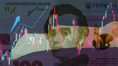 купюра у 100 грн на тлі графіків