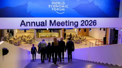 People walk at the Davos Congress Centre ahead of the World Economic Forum (WEF), in the ski resort of Davos, Switzerland, January 18, 2026. REUTERS/Denis Balibouse
