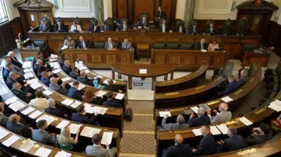 Overhead shot of the council meting.