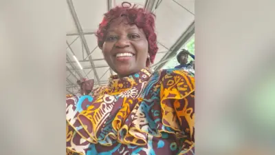 A woman smiling for the camera