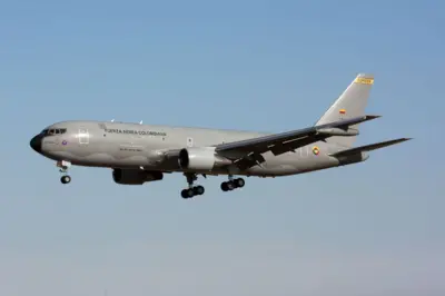 A Colombia Air Force Boeing KC767 MMTT tanker lands at Lisbon Delgado airport.