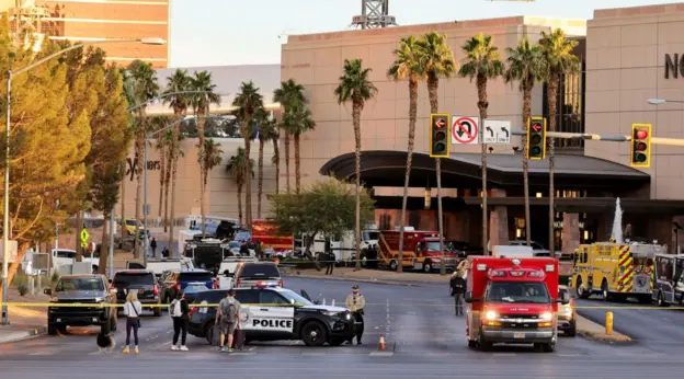 Vehicles from‍ the police and fire departments surround the Trump hotel in Las Vegas