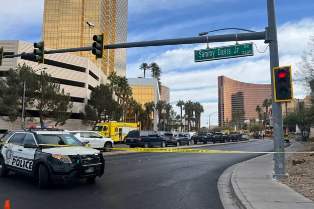A ‍police car blocks off a section ‍of the Las Vegas Strip