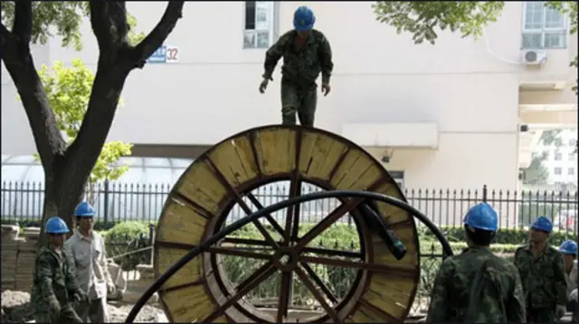 Công nhân Trung Quốc tại Bắc Kinh (Reuters)