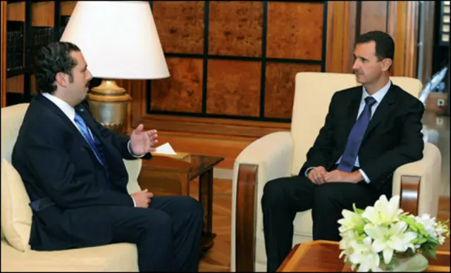 الأسد (يمين) يستقبل الحريري