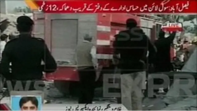 Gambar di televisi setempat yang menggambarkan situasi pasca ledakan bom.