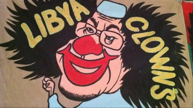 Berbagai seni karikatur coretan dinding yang muncul di berbagai tempat di kota Benghazi yang dikuasai pemberontak Libia mengolok-olok pemimpin Libia Muammar Gaddafi yang sudah berkuasa selama 40 tahun. 