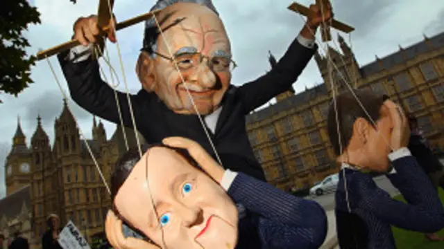 Topeng Rupert Murdoch dan PM Cameron