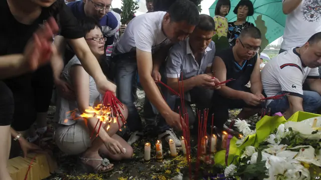 Поминки жертв катастрофы в Китае