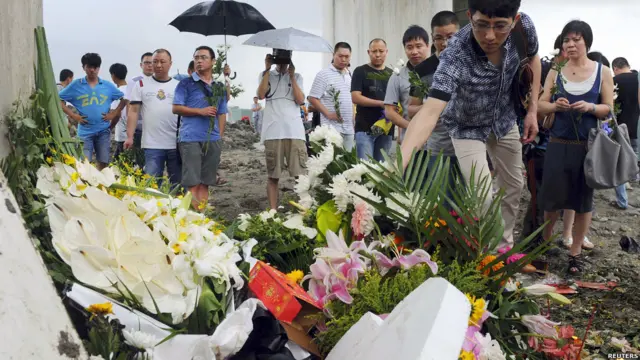 Поминки жертв катастрофы в Китае