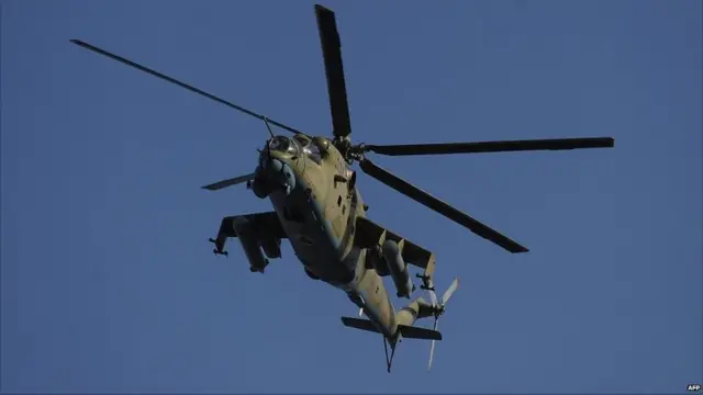 Helikopter Angkatan Bersenjata Afghanistan terlihat terbang di atas tempat kejadian. Tembak menembak terdengar selama empat jam. 