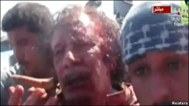 বিদ্রোহীদের হাতে জীবিত কর্ণেল গাদ্দফি