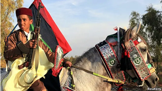 Một tay súng Libya được chào đón khi trở về Benghazi hôm 22/10