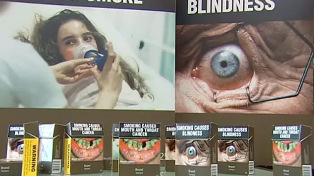 දුම් බීමේ ආදීනව සිගරැට් පැකට්ටු මත 